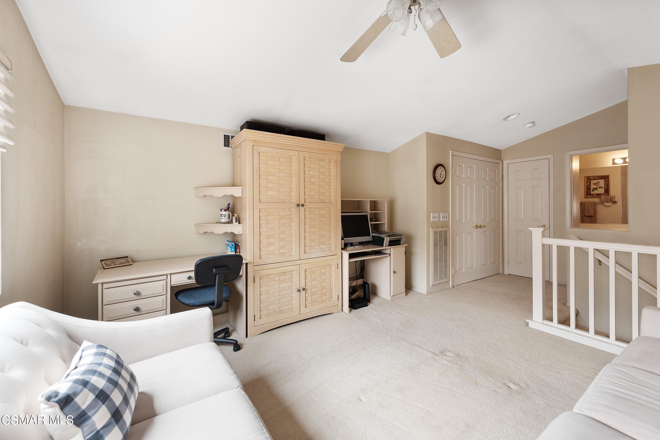 5642 Daisy Street Simi Valley, CA 93063 - Photo 26 of 41 a kitchen with a refrigerator a stove and cabinets