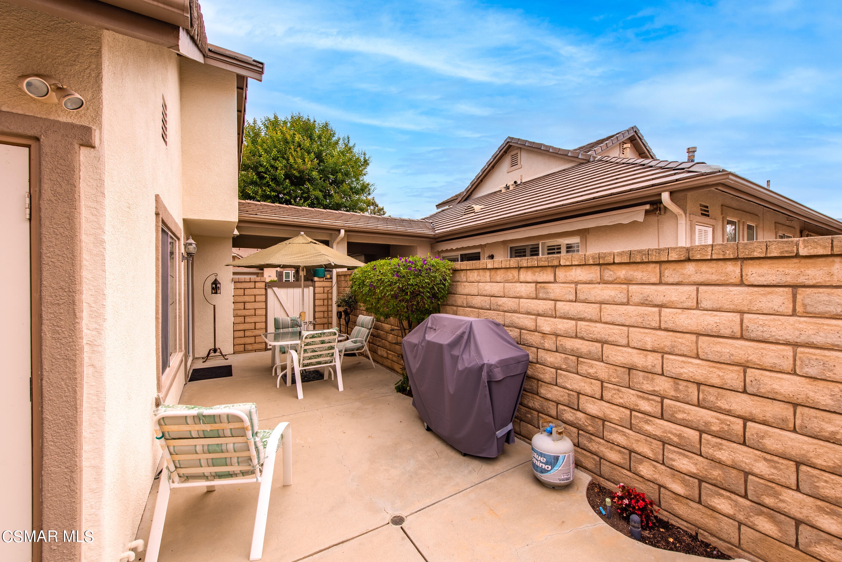5642 Daisy Street Simi Valley, CA 93063 - Photo 35 of 41 a backyard of a house with table and chairs