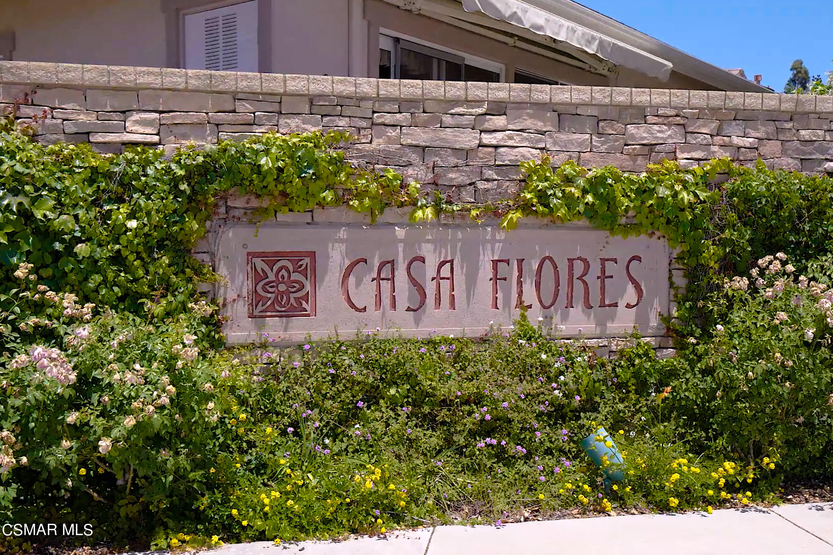 5642 Daisy Street Simi Valley, CA 93063 - Photo 36 of 41 a sign that is on a brick wall