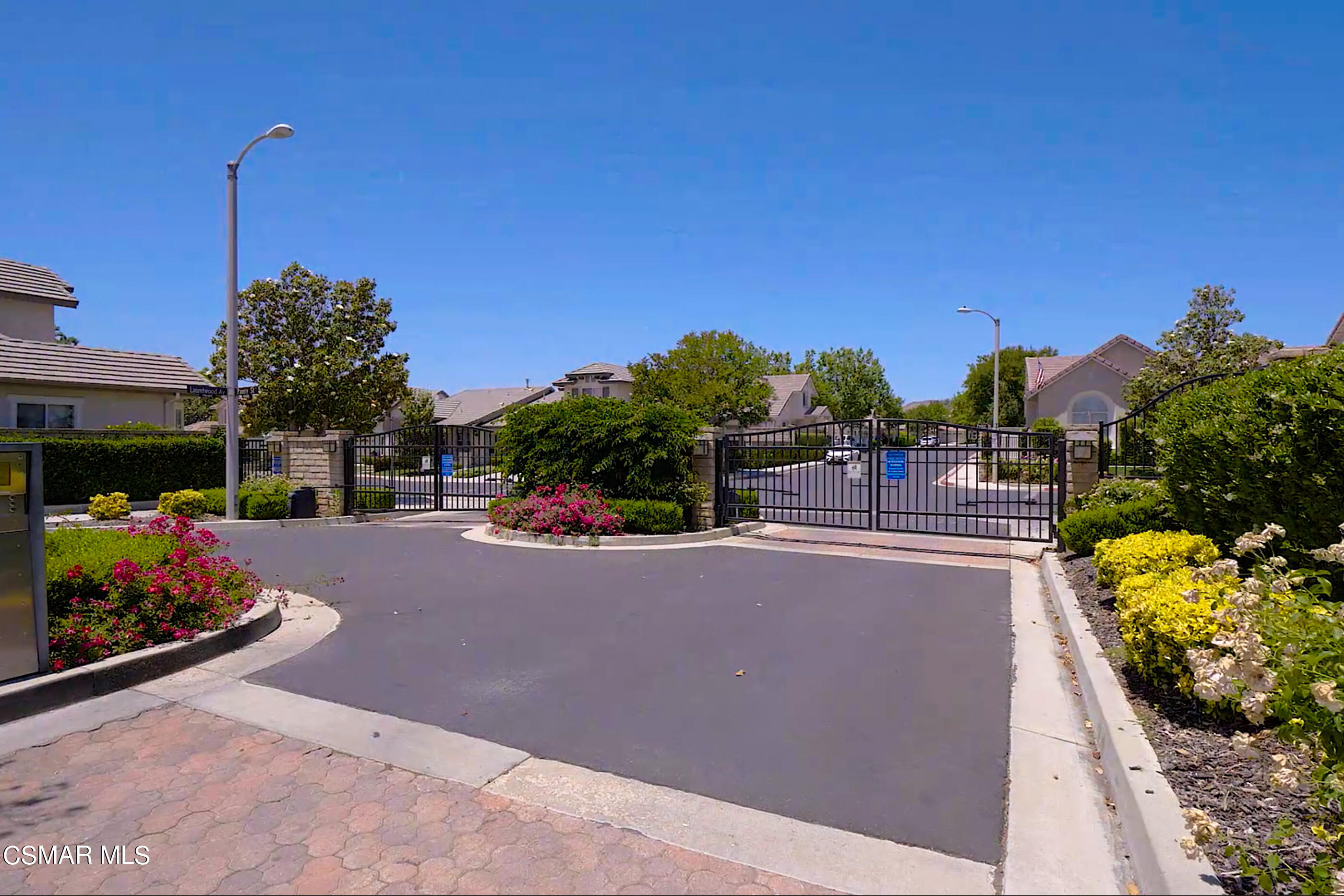5642 Daisy Street Simi Valley, CA 93063 - Photo 37 of 41 a picture of a building with a garden and plants