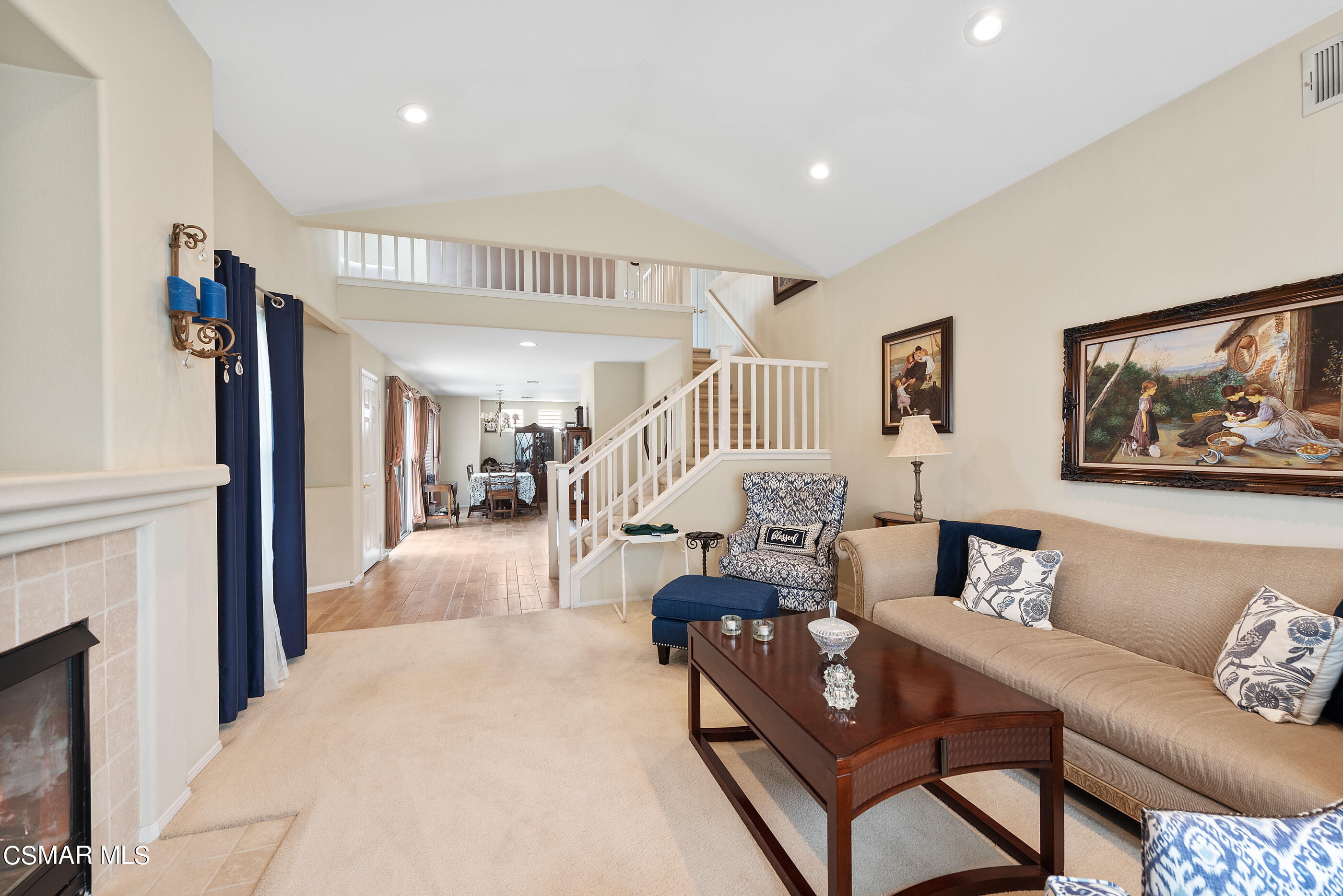 5642 Daisy Street Simi Valley, CA 93063 - Photo 7 of 41 a living room with furniture and a fireplace