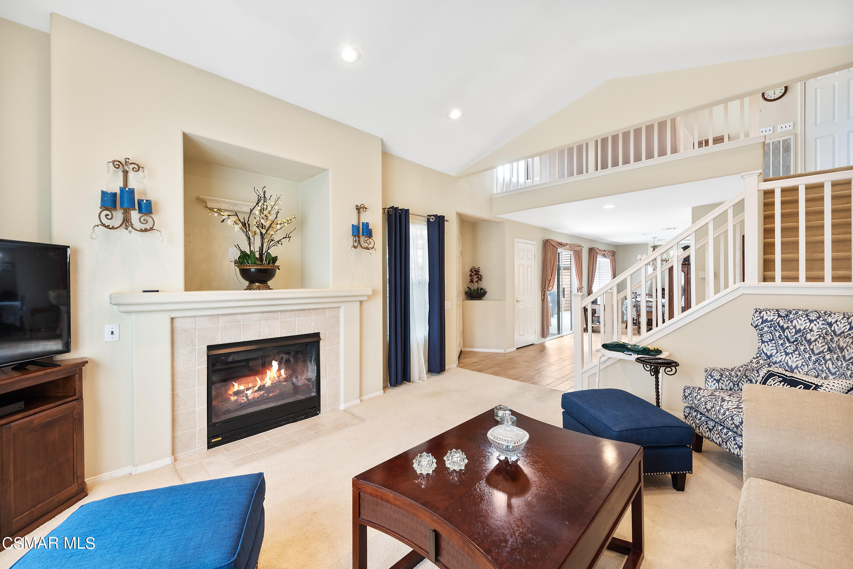5642 Daisy Street Simi Valley, CA 93063 - Photo 8 of 41 a living room with furniture and a fireplace