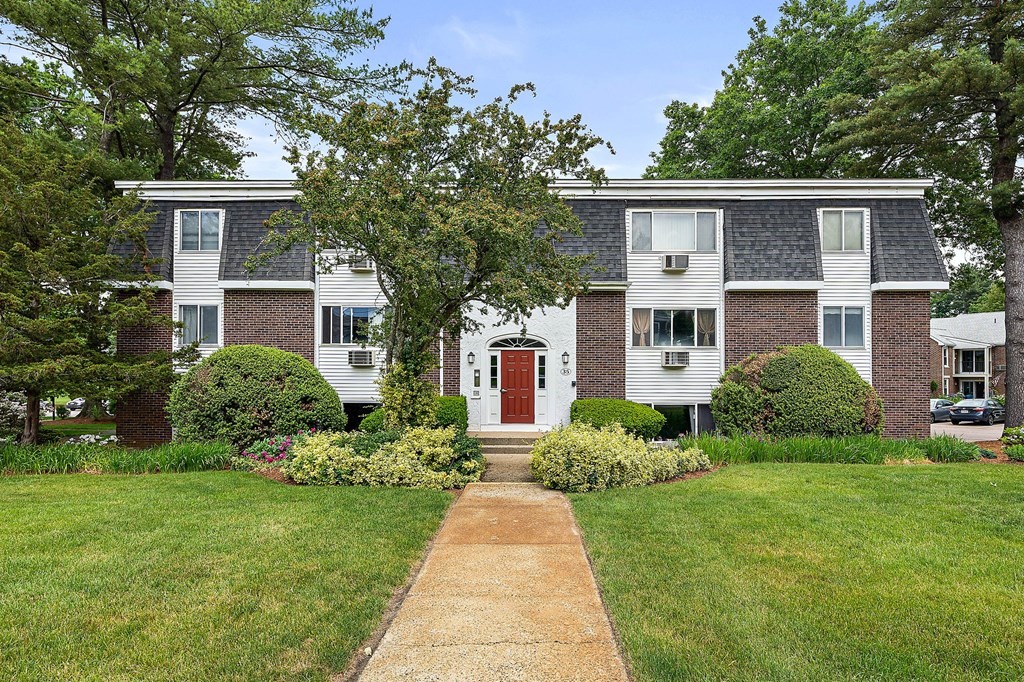 35 Will Drive, Unit 3 Canton, MA 02021 - Photo 1 of 18 front view of a house with a yard