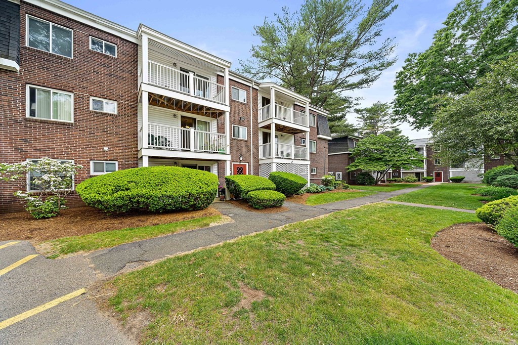 35 Will Drive, Unit 3 Canton, MA 02021 - Photo 16 of 18 a view of a building with a garden