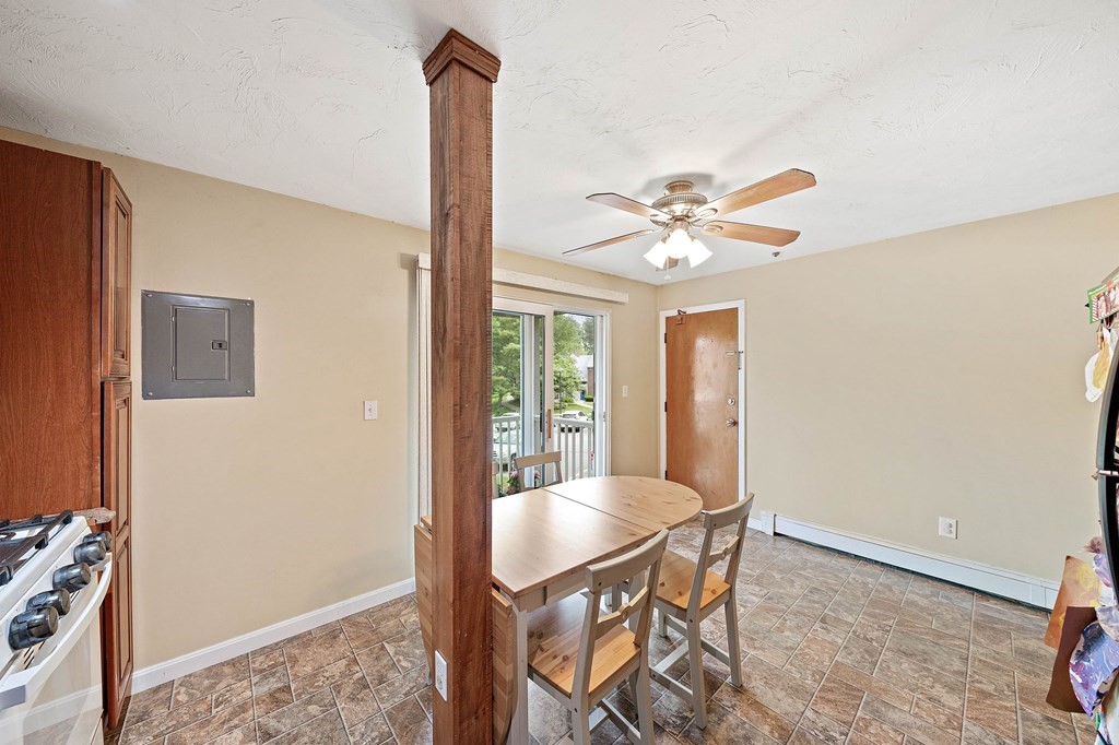 35 Will Drive, Unit 3 Canton, MA 02021 - Photo 4 of 18 a dining room with furniture and a window