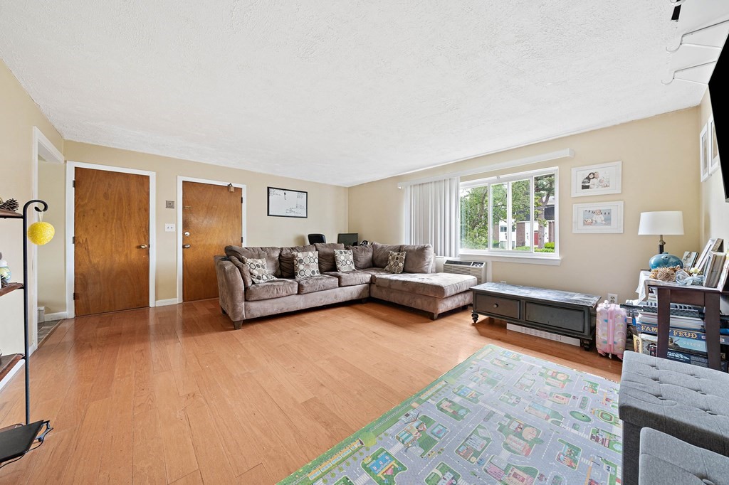 35 Will Drive, Unit 3 Canton, MA 02021 - Photo 6 of 18 a living room with furniture and a couch