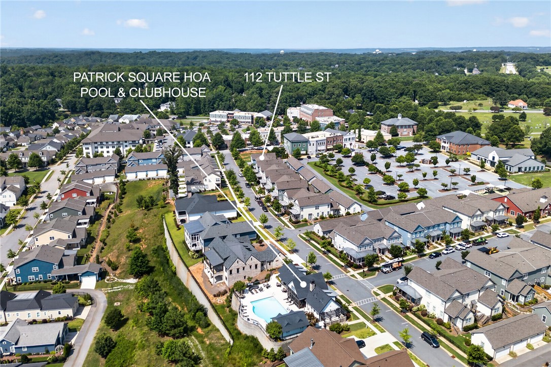 112 Tuttle Street Clemson, SC 29631 - Photo 32 of 46 An aerial perspective reveals a vibrant community with tree-lined streets and verdant surroundings.