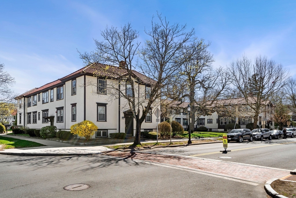 a view of a building with a street