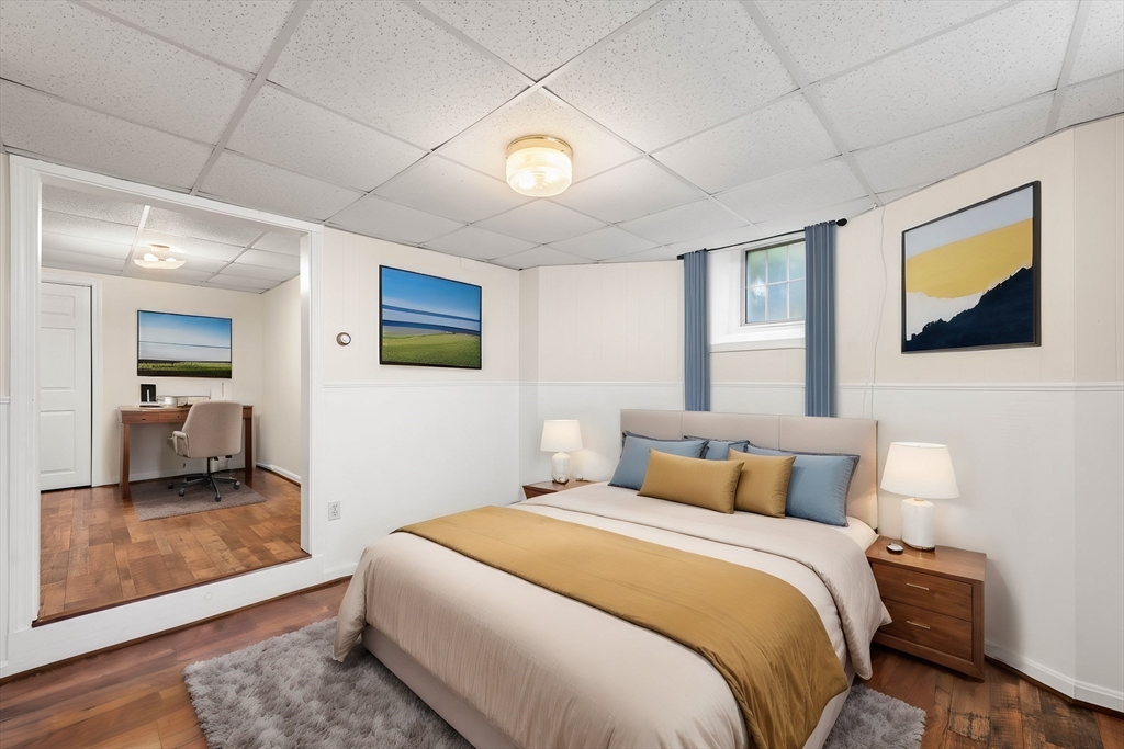 98 Main Street, Unit V Andover, MA 01810 - Photo 13 of 21 a bedroom with a bed and a view of bathroom