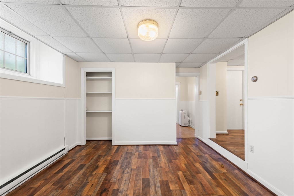 98 Main Street, Unit V Andover, MA 01810 - Photo 14 of 21 a view of a room with wooden floor