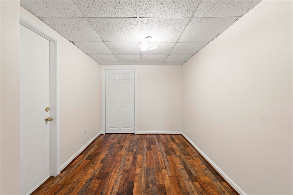 98 Main Street, Unit V Andover, MA 01810 - Photo 15 of 21 a view of empty room with wooden floor