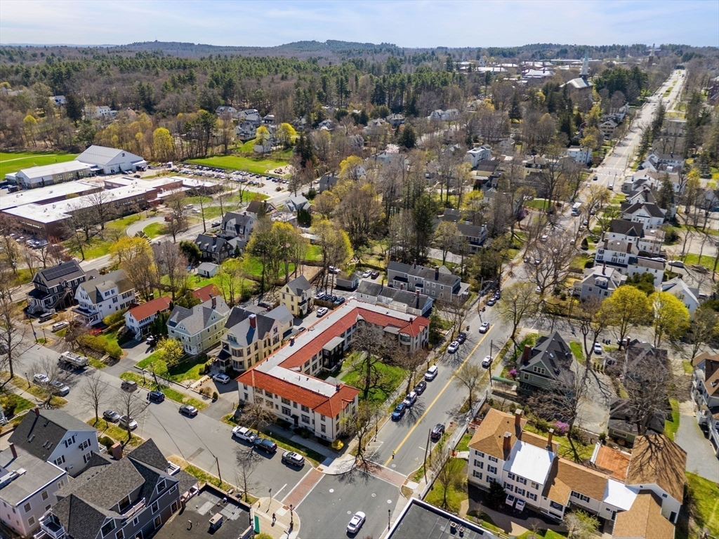 98 Main Street, Unit V Andover, MA 01810 - Photo 20 of 21 an aerial view of residential houses with outdoor space
