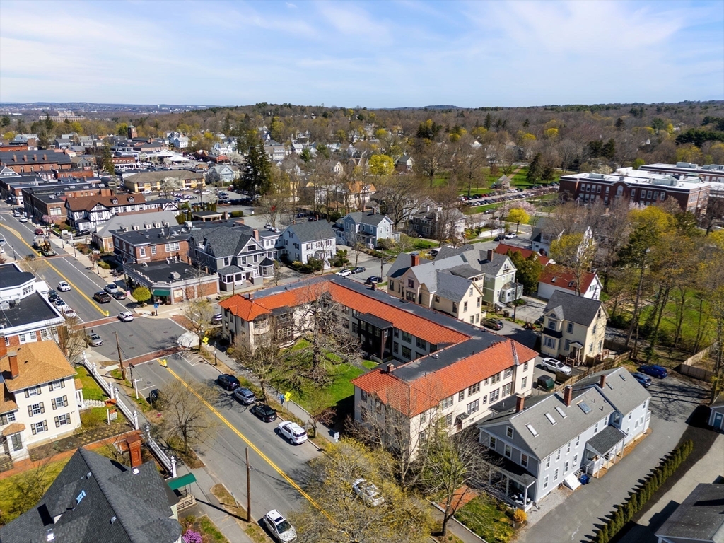 98 Main Street, Unit V Andover, MA 01810 - Photo 21 of 21 an aerial view of a city with lots of residential buildings