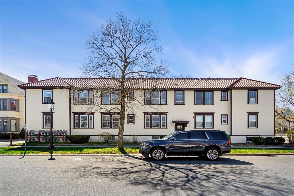 98 Main Street, Unit V Andover, MA 01810 - Photo 5 of 21 a car parked in front of a house