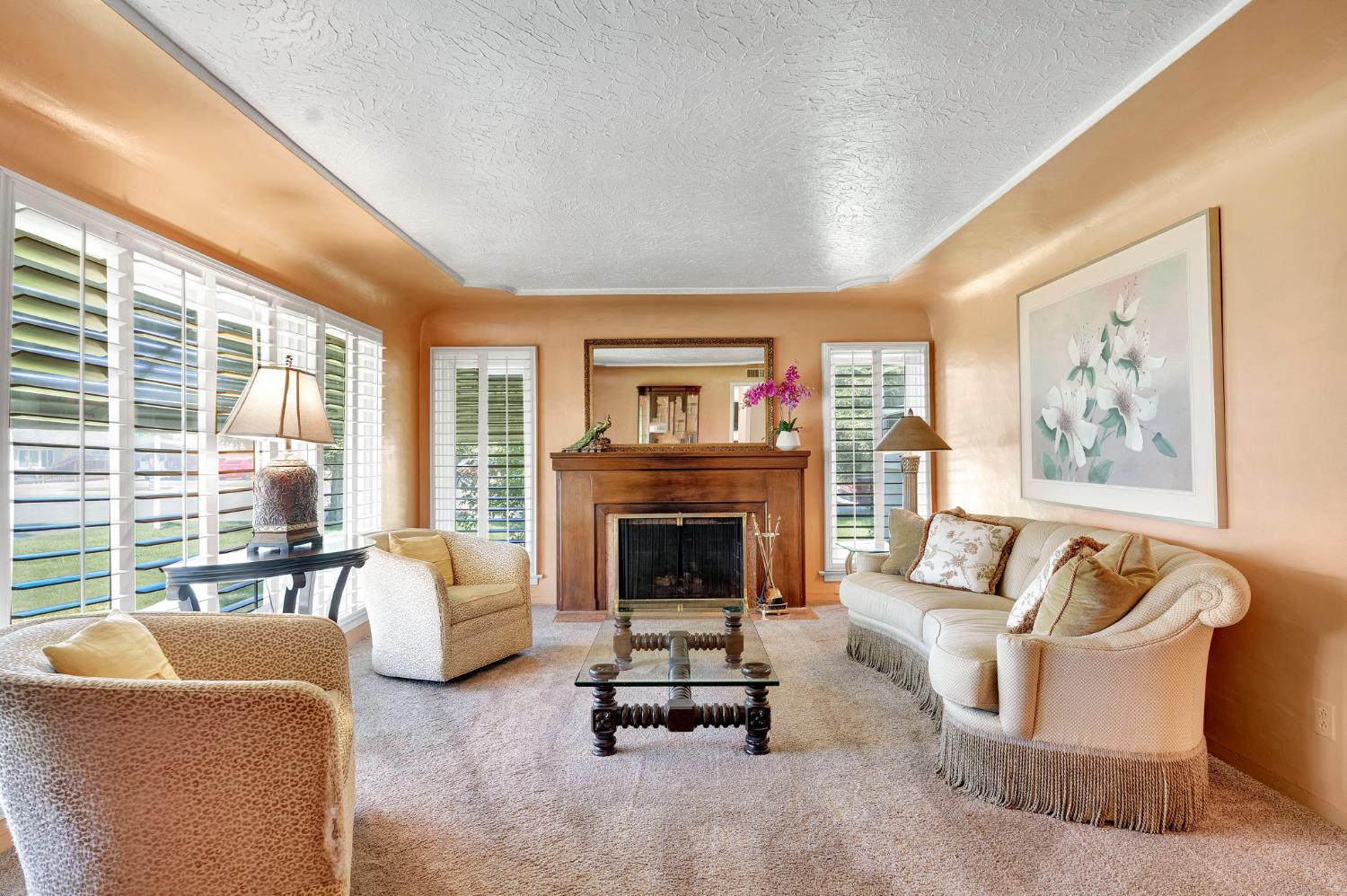 200 Lyons Street Madera, CA 93638 - Photo 8 of 32 a living room with furniture and a fireplace
