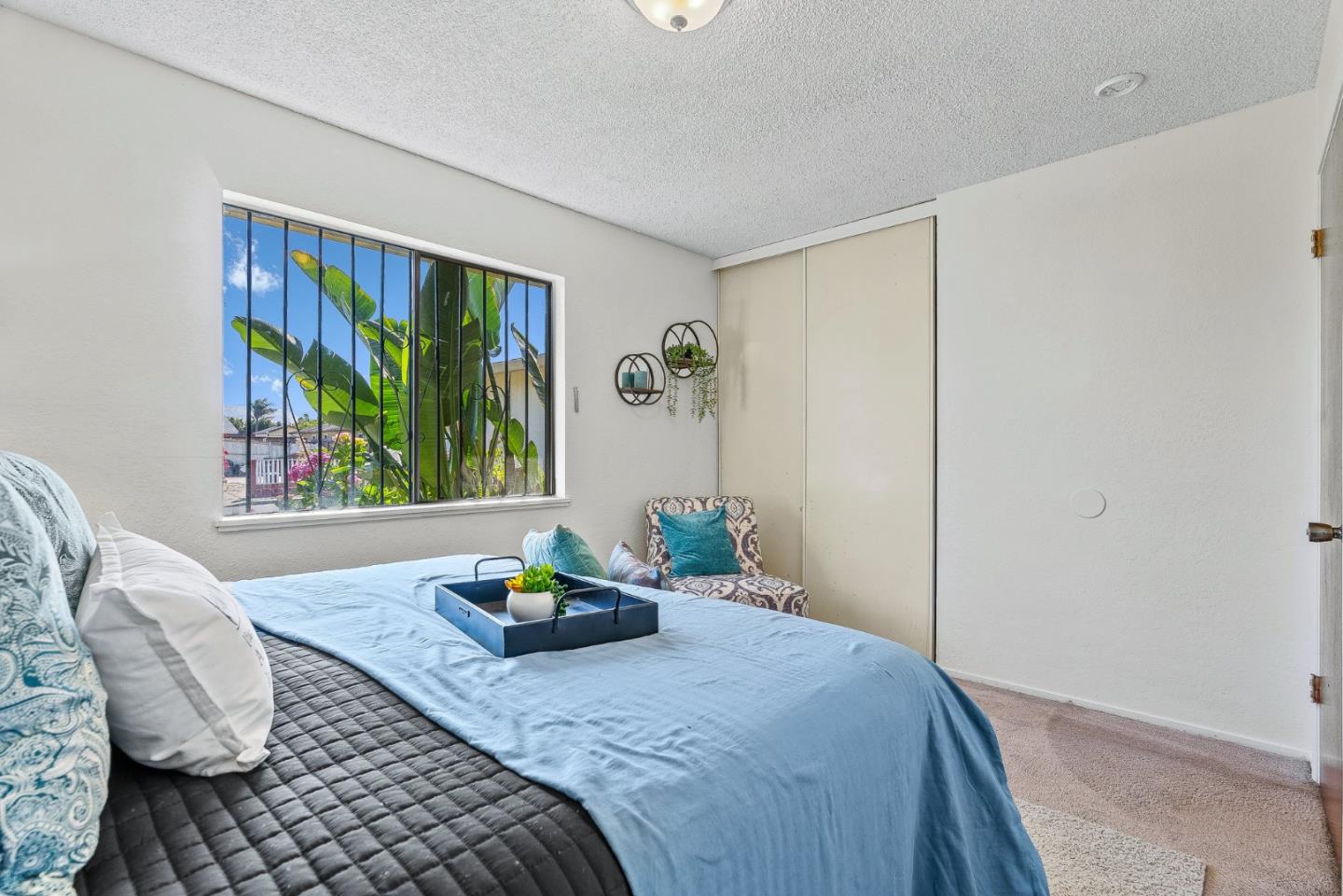 742 Pino Way Salinas, CA 93905 - Photo 11 of 30 a bedroom with a large bed and a window