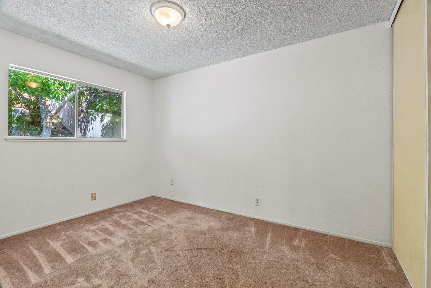 742 Pino Way Salinas, CA 93905 - Photo 12 of 30 an empty room with a window