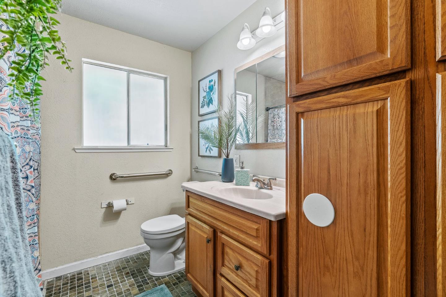 742 Pino Way Salinas, CA 93905 - Photo 13 of 30 a bathroom with a sink a toilet and mirror
