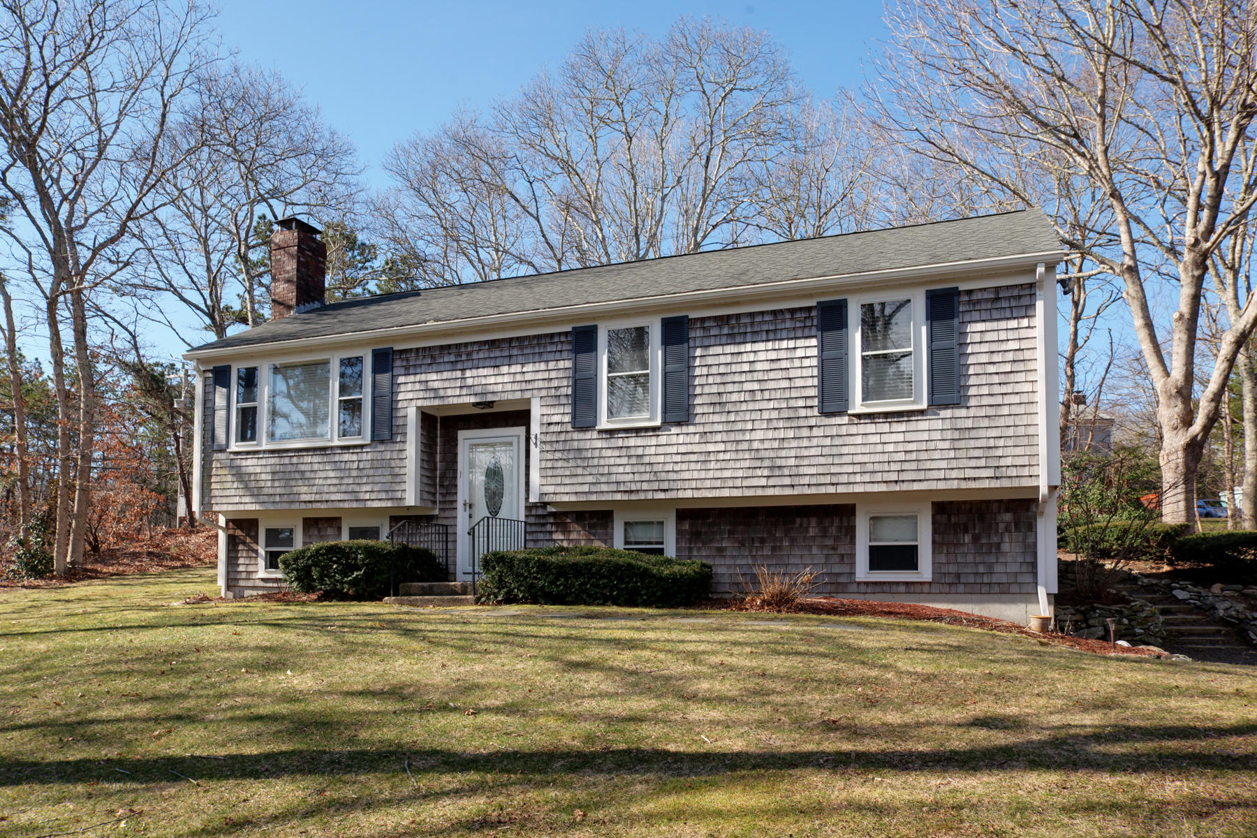 1 Meredith Road Forestdale, MA 02644 - Photo 3 of 24 a front view of a house with a garage
