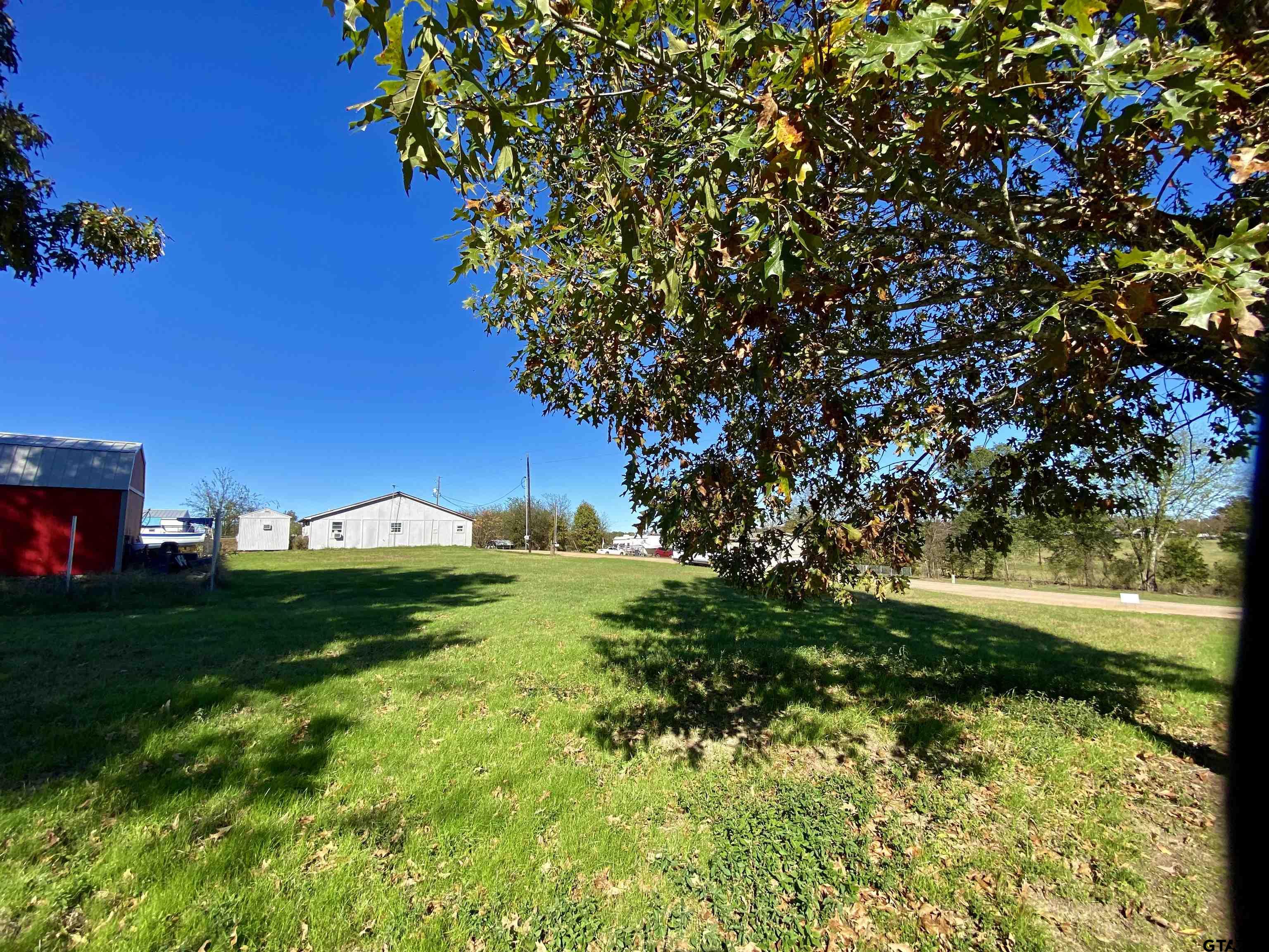 Lot 107-108 Concho Quitman, TX 75783 - Photo 4 of 14 a view of a yard