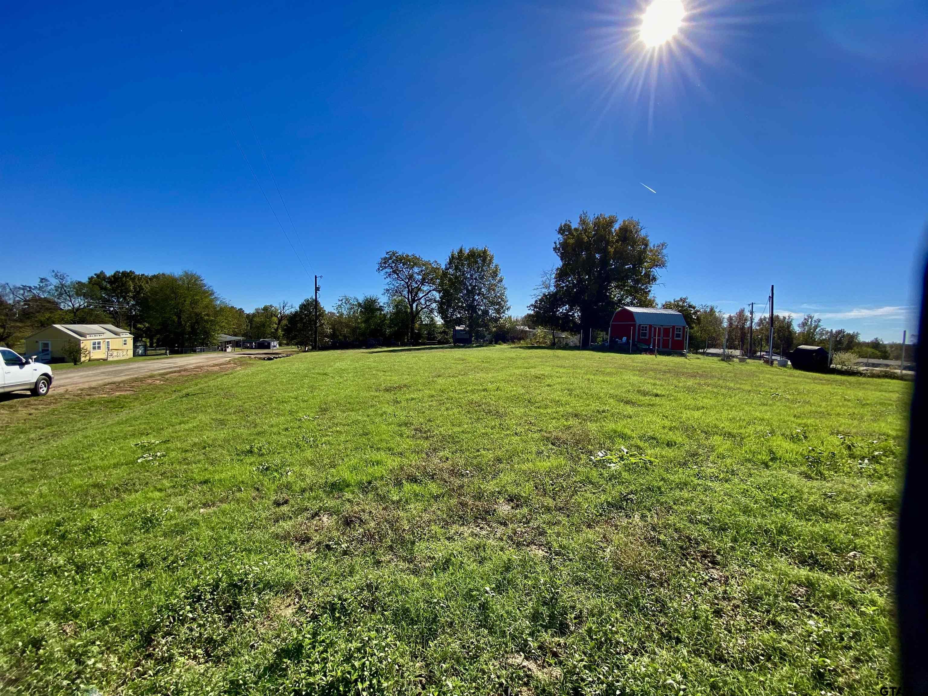 Lot 107-108 Concho Quitman, TX 75783 - Photo 6 of 14 a view of a garden with a house