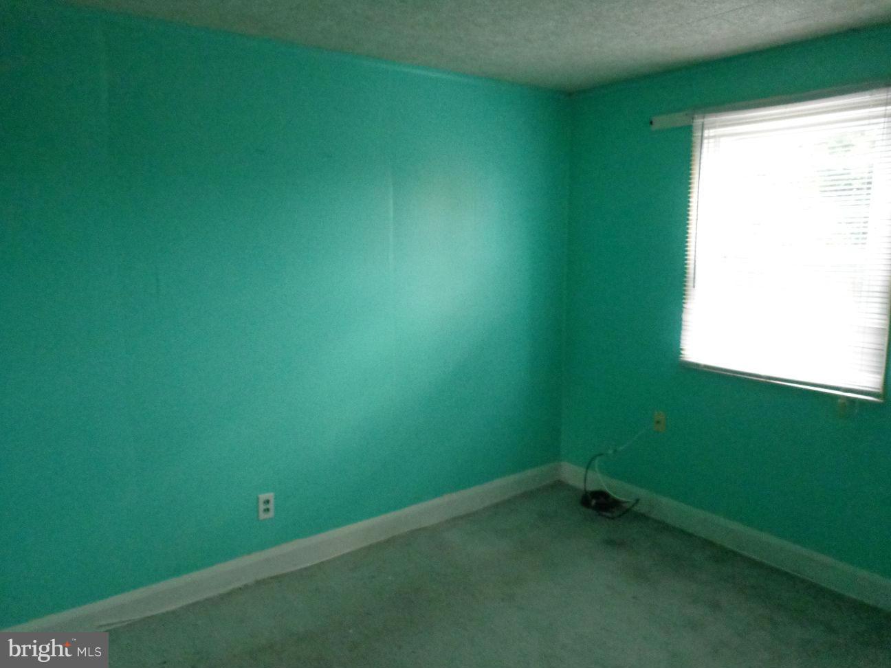 2719 Southbrook Road Dundalk, MD 21222 - Photo 11 of 18 a room with a window and a ceiling fan
