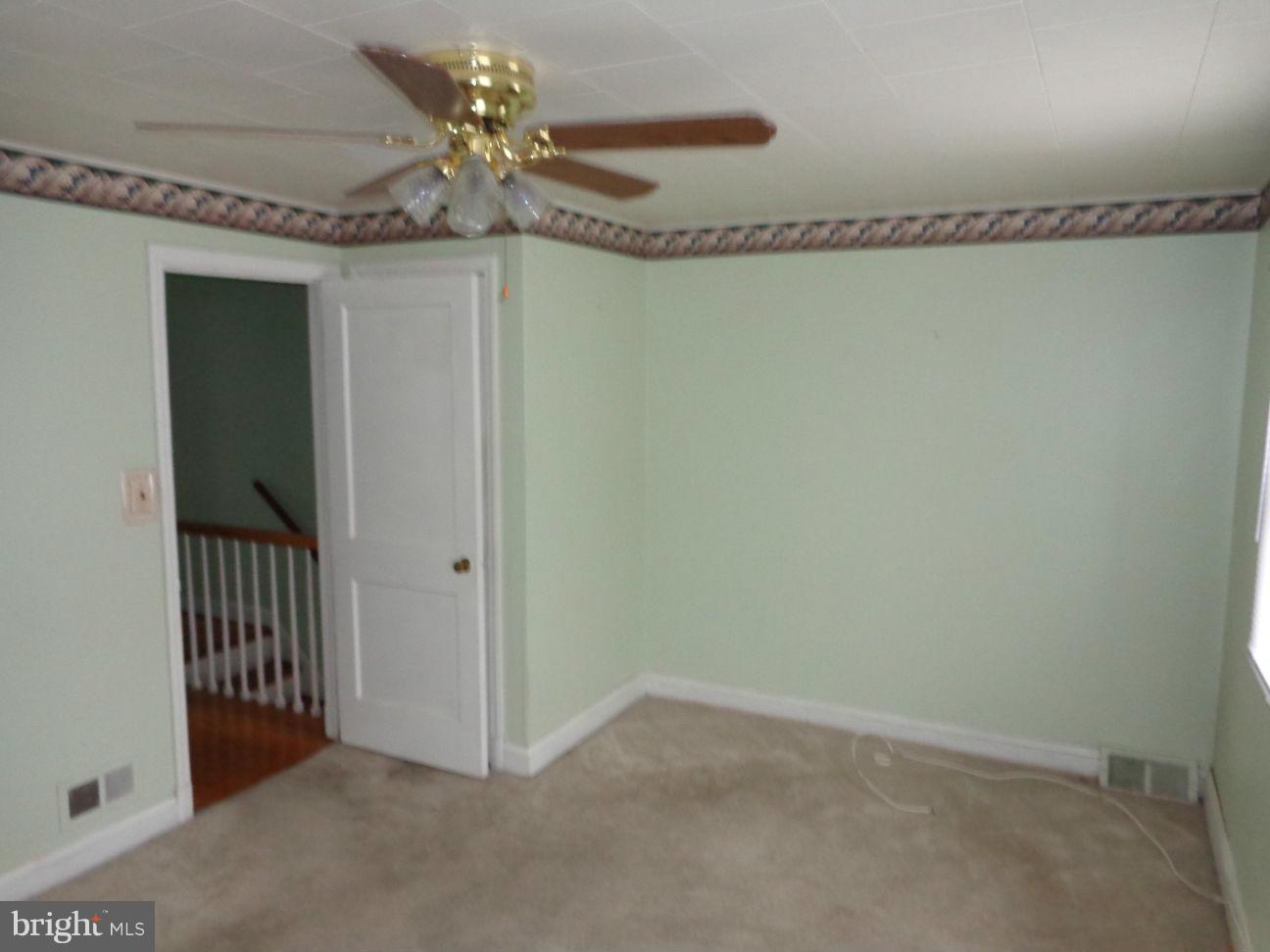 2719 Southbrook Road Dundalk, MD 21222 - Photo 12 of 18 a view of a chandelier fan in big room