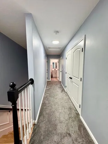 a view of hallway with stairs