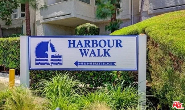 a sign broad in front of a building