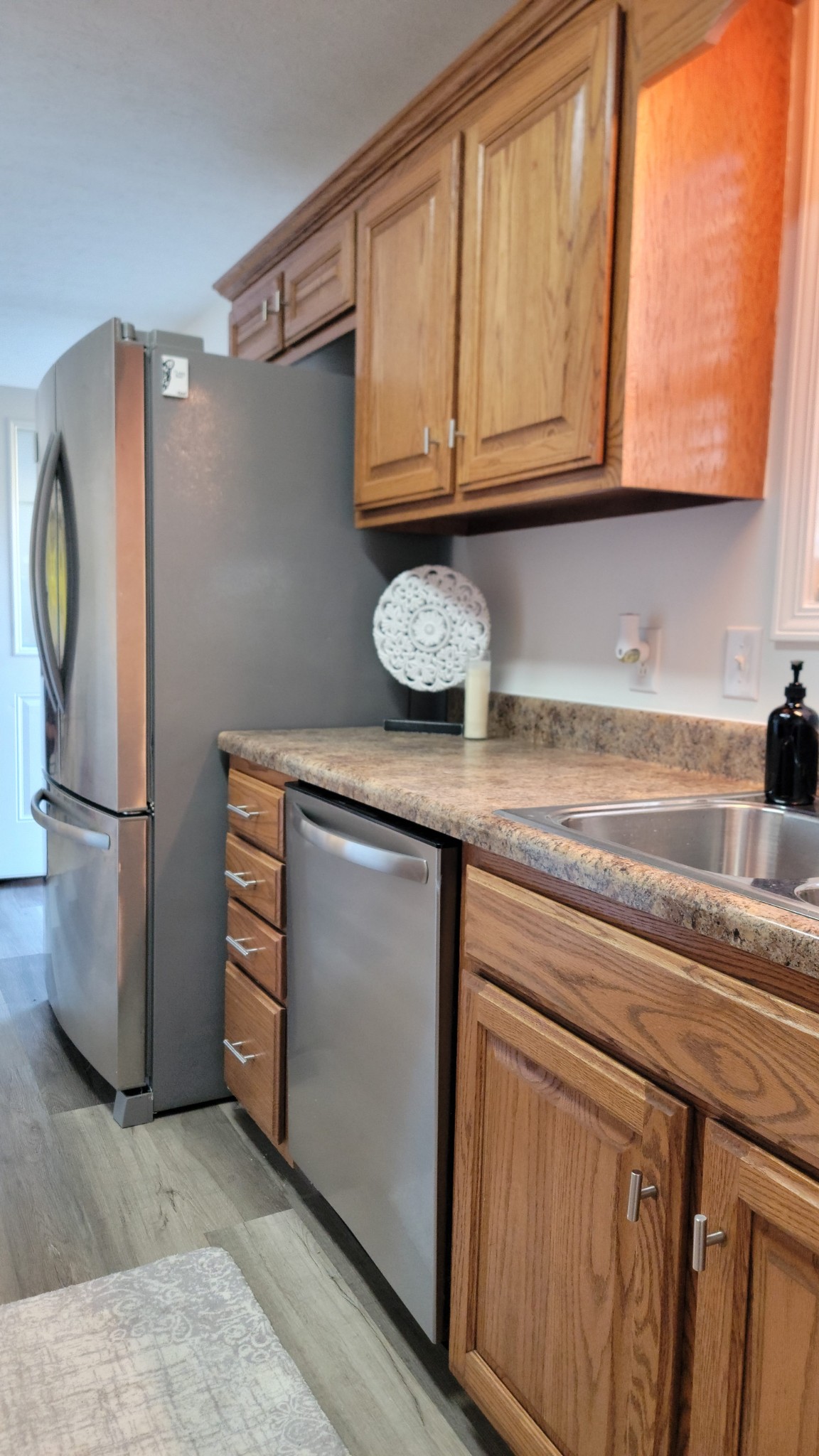 195 Rileys Bend Road Lynchburg, TN 37352 - Photo 12 of 32 a kitchen with stainless steel appliances granite countertop a refrigerator and a stove
