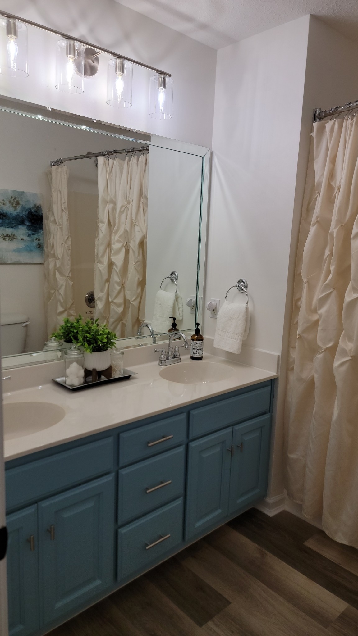 195 Rileys Bend Road Lynchburg, TN 37352 - Photo 15 of 32 a bathroom with a double vanity sink and a mirror