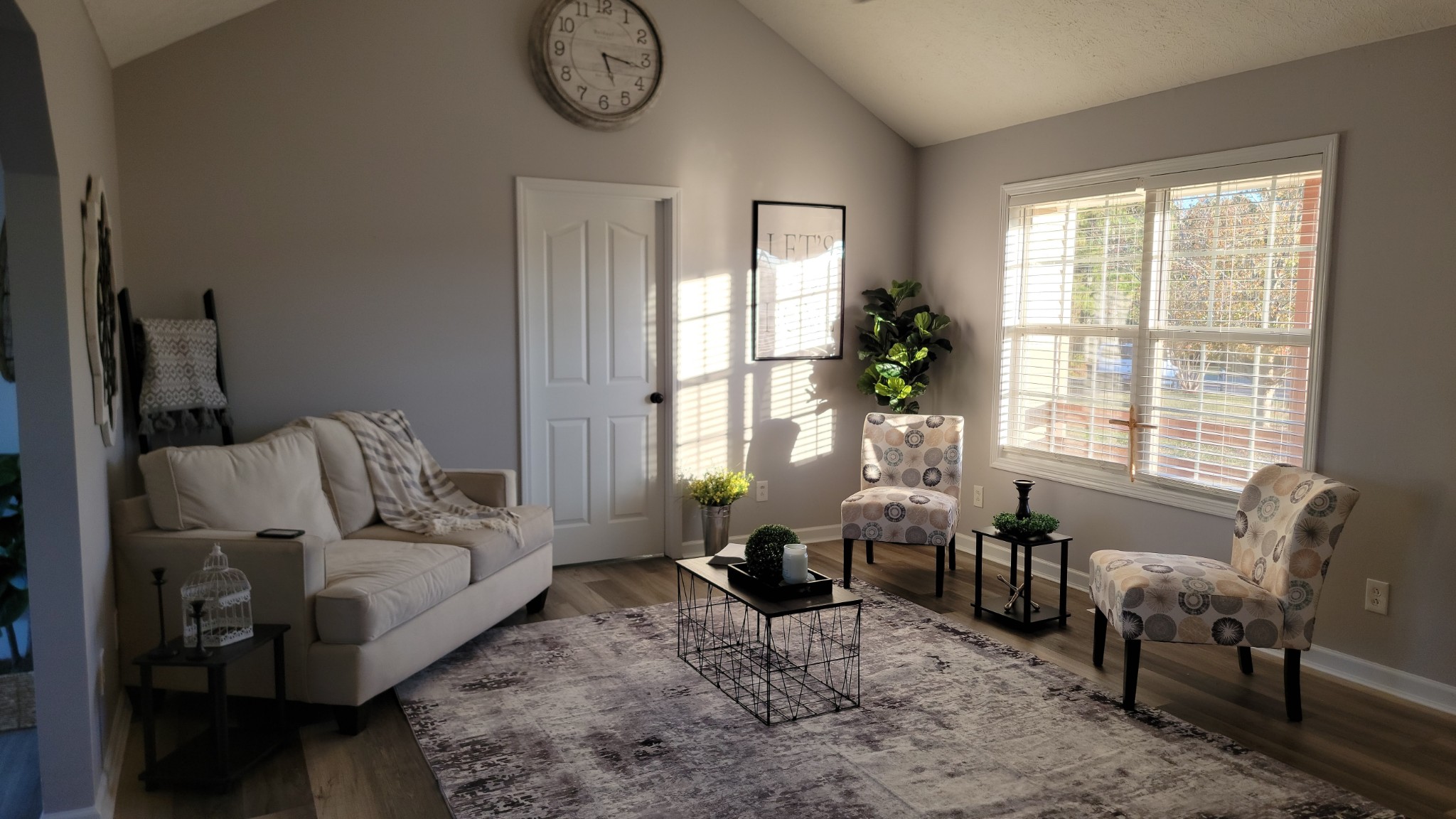 195 Rileys Bend Road Lynchburg, TN 37352 - Photo 19 of 32 a living room with furniture fireplace and a large window
