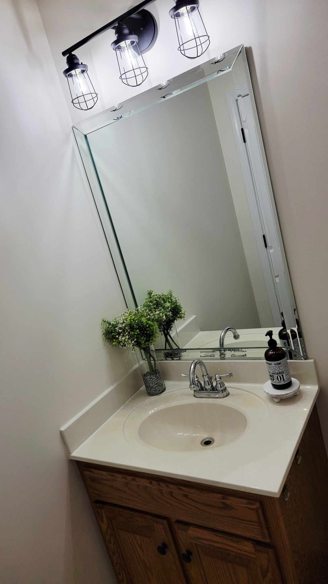 195 Rileys Bend Road Lynchburg, TN 37352 - Photo 22 of 32 a bathroom with a sink and a mirror
