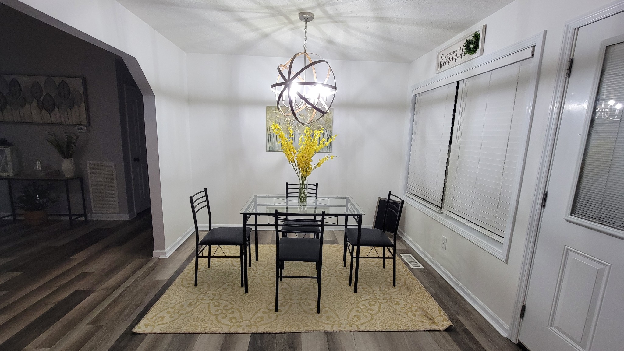 195 Rileys Bend Road Lynchburg, TN 37352 - Photo 27 of 32 a view of a dining room with furniture window and wooden floor