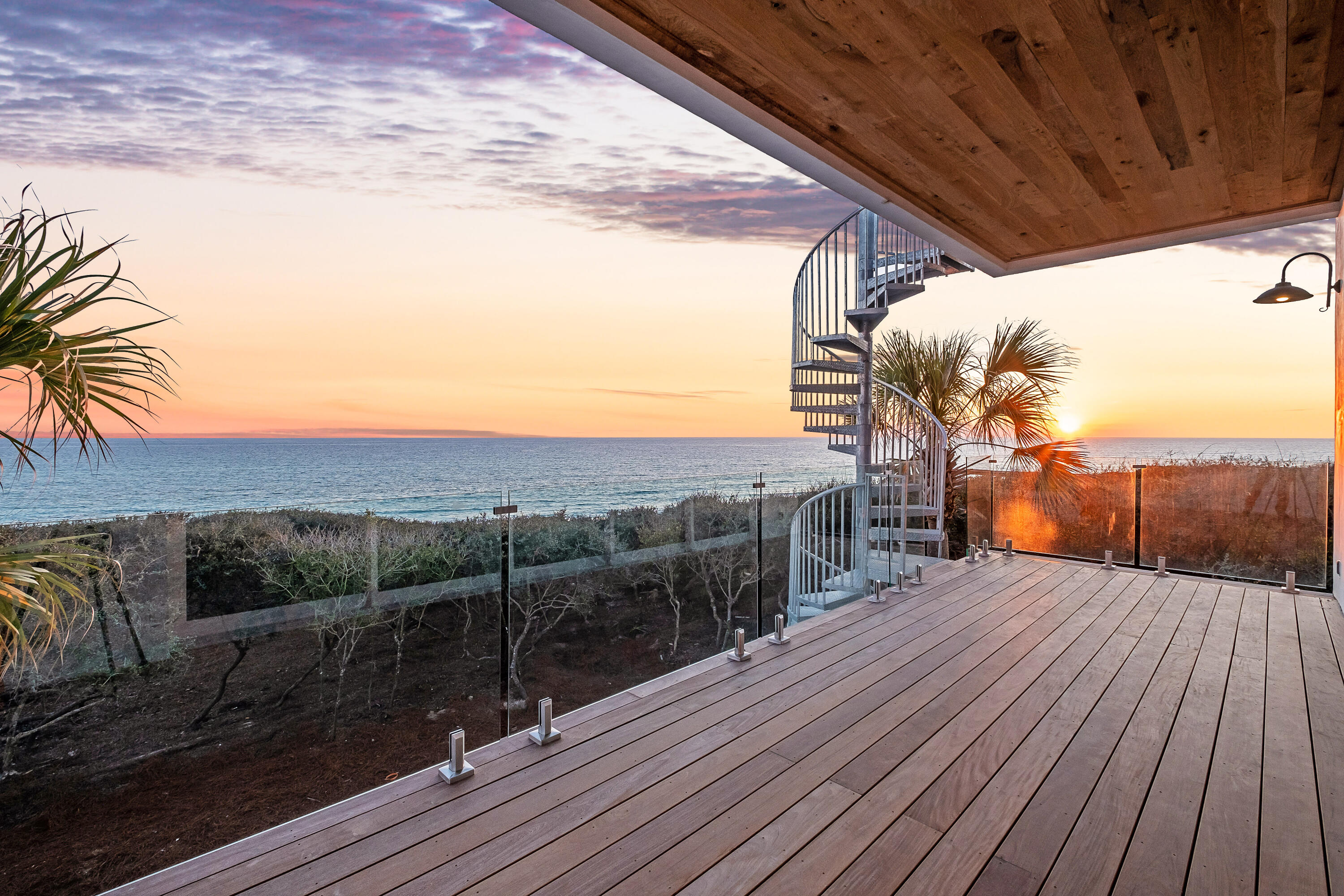 40 Jasmine Circle Santa Rosa Beach, FL 32459 - Photo 11 of 100 a view of a roof deck with wooden floor and fence