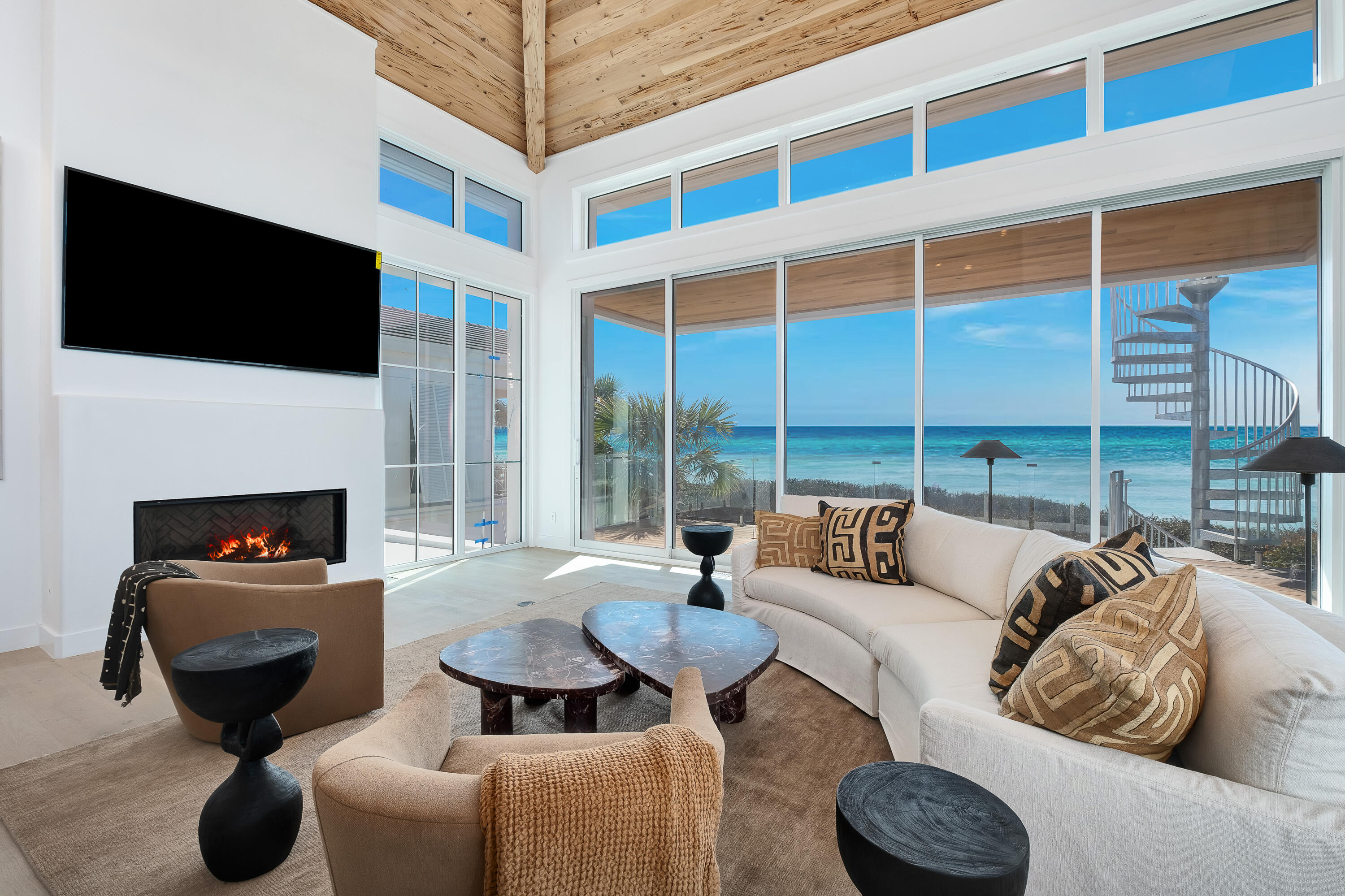 40 Jasmine Circle Santa Rosa Beach, FL 32459 - Photo 17 of 100 a living room with furniture a flat screen tv and a fireplace