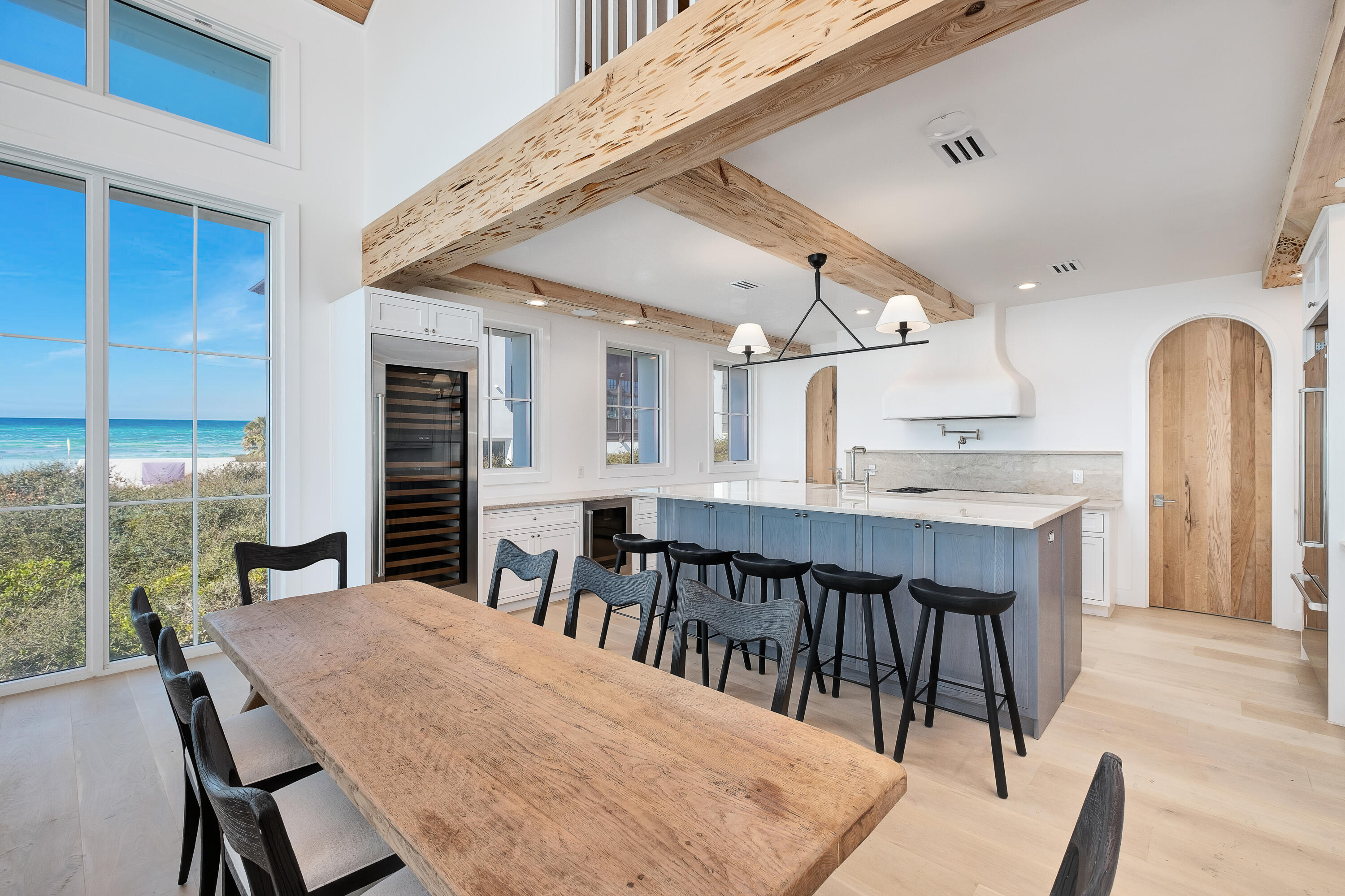 40 Jasmine Circle Santa Rosa Beach, FL 32459 - Photo 24 of 100 a open kitchen with stainless steel appliances kitchen island a dining table and chairs