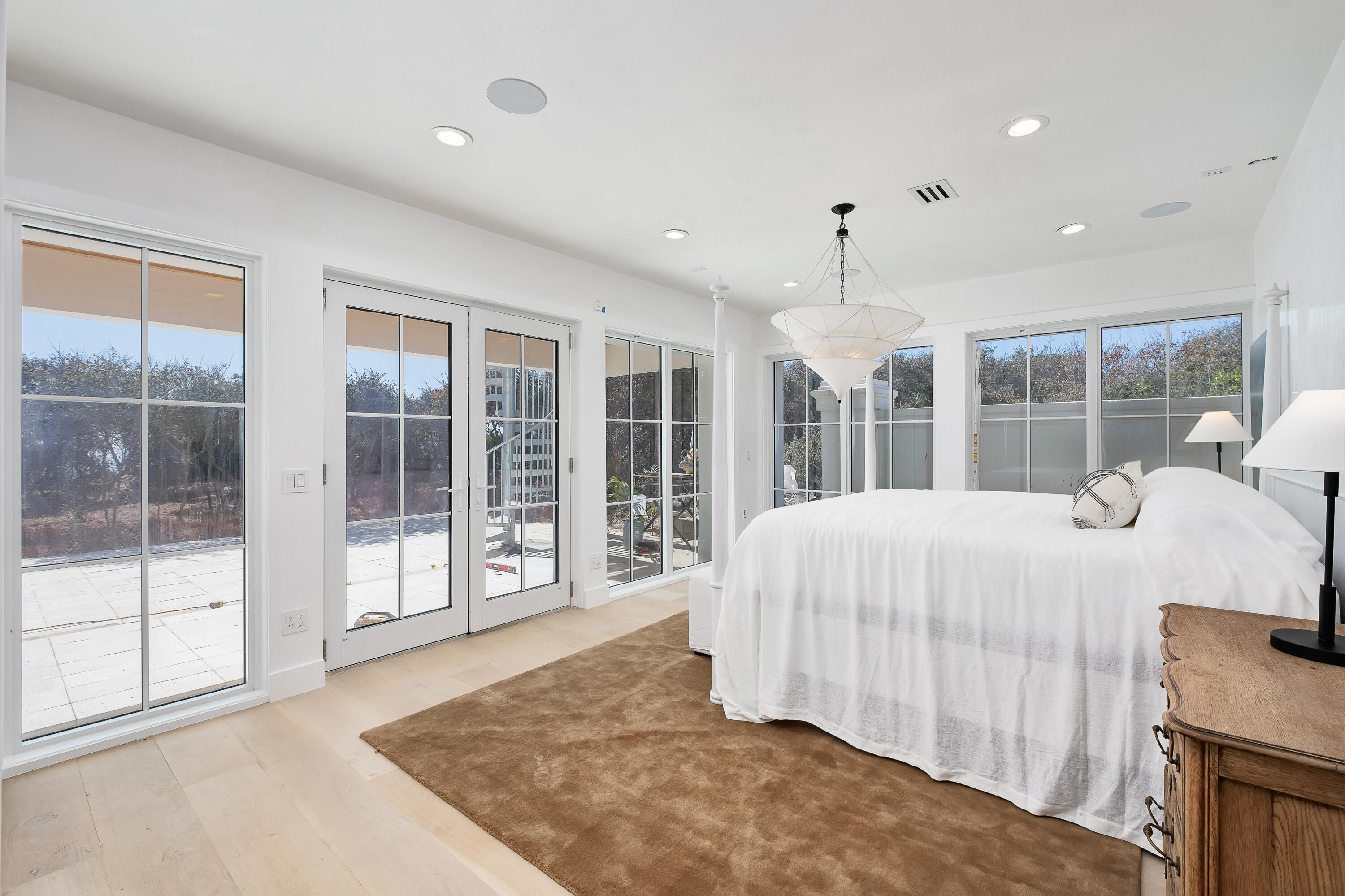 40 Jasmine Circle Santa Rosa Beach, FL 32459 - Photo 40 of 100 a spacious bedroom with a large bed and a large window