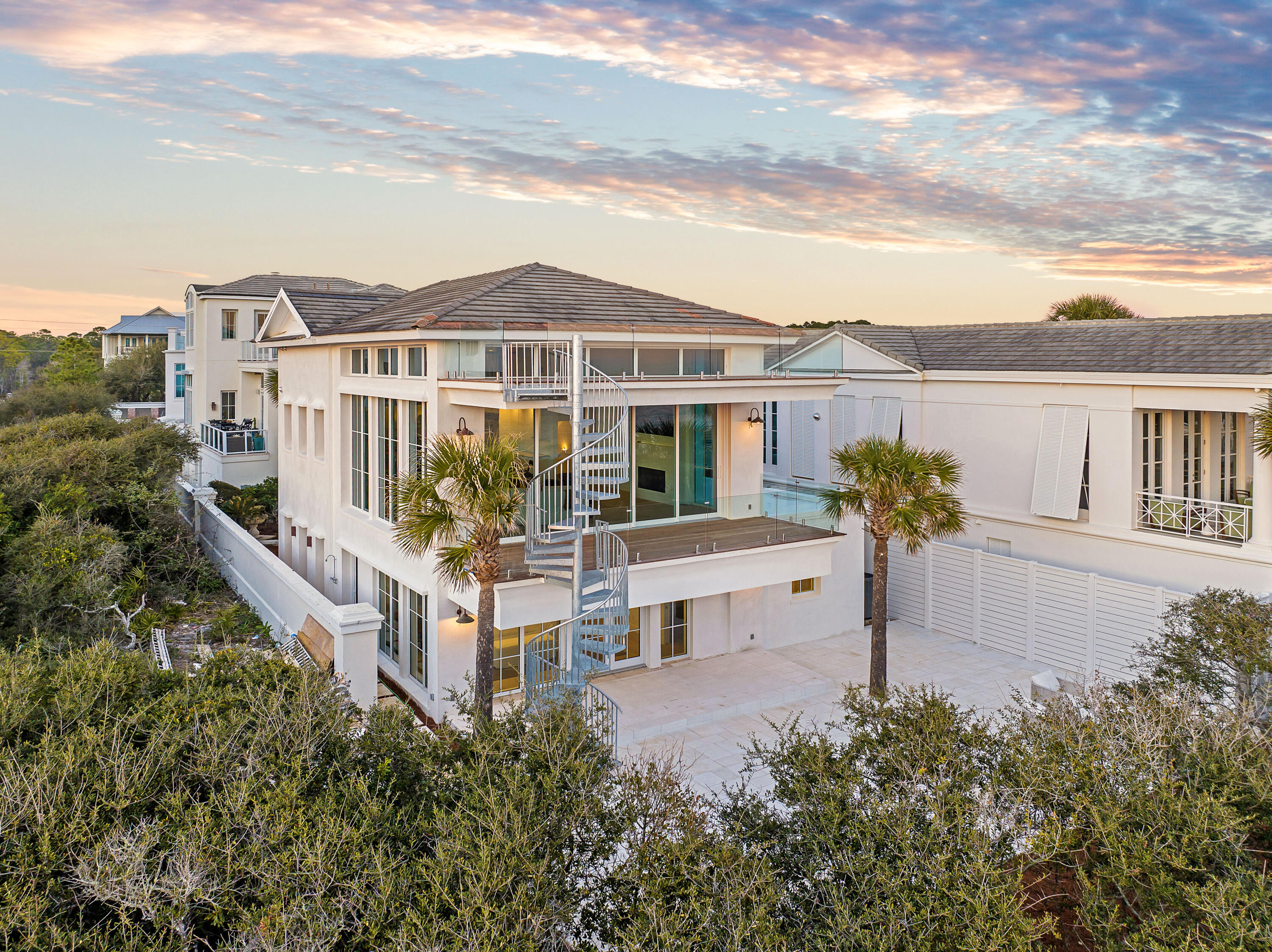 40 Jasmine Circle Santa Rosa Beach, FL 32459 - Photo 4 of 100 a front view of a house with a garden
