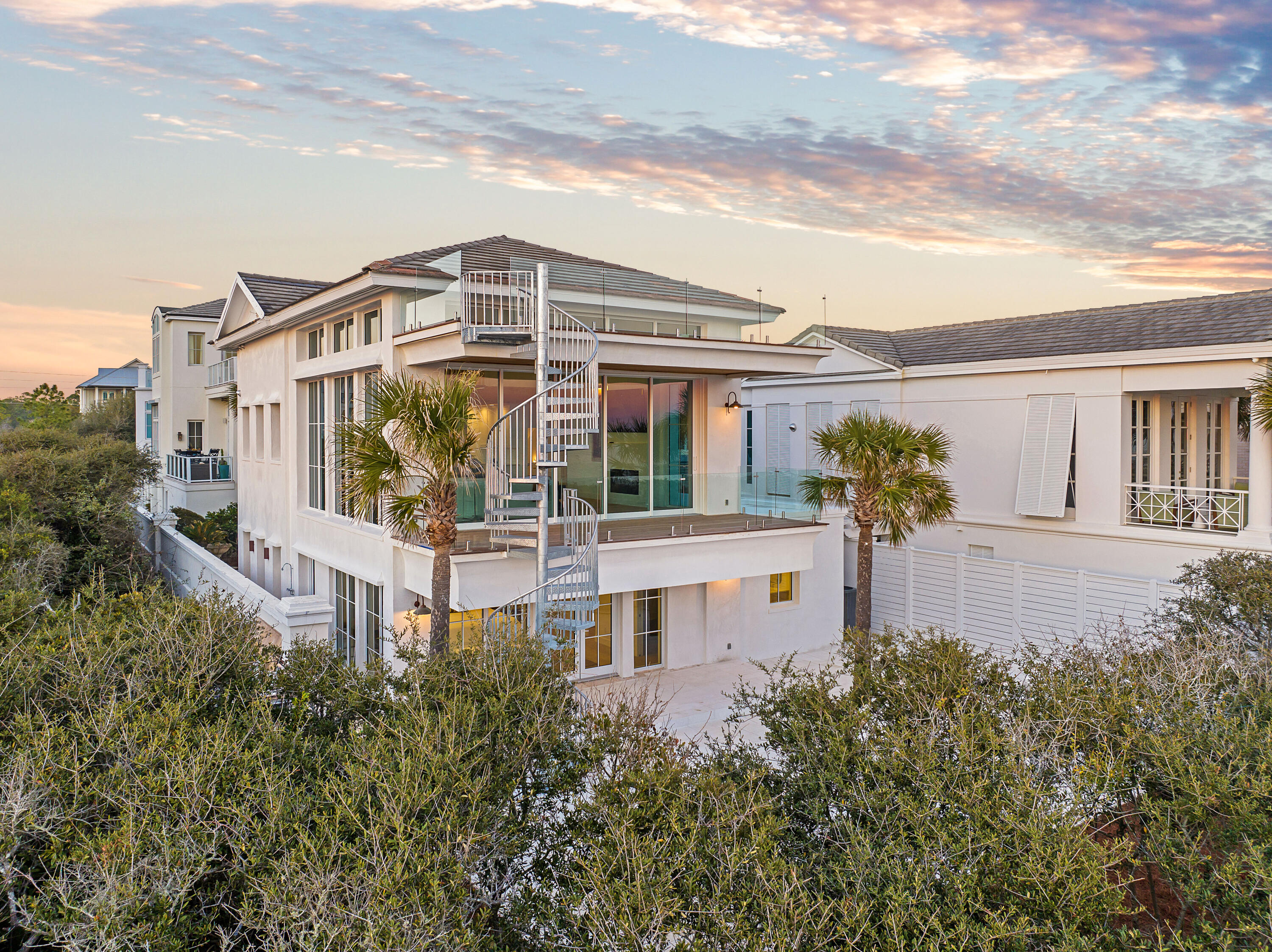 40 Jasmine Circle Santa Rosa Beach, FL 32459 - Photo 84 of 100 a flower garden is sitting in front of a house