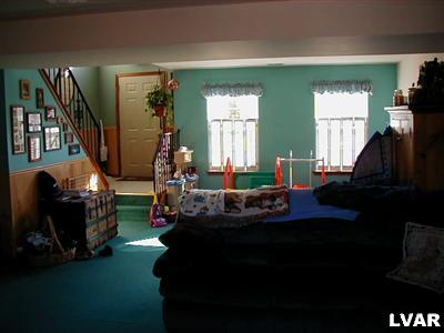 4219 Cider Press Road Slatington, PA 18080 - Photo 2 of 7 super spacious family room with sliders to large rear patio.