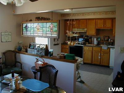 4219 Cider Press Road Slatington, PA 18080 - Photo 5 of 7 large oak eat in kitchen from the bright and cheery dining room.