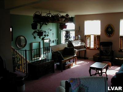 4219 Cider Press Road Slatington, PA 18080 - Photo 6 of 7 spacious living room opening to the dining room, kitchen and foyer. great view.