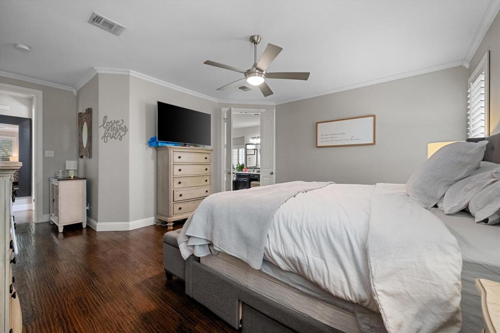 6713 Matador Ranch Road North Richland Hills, TX 76182 - Photo 19 of 39 Bedroom featuring wood finished floors, ornamental molding, and ceiling fan