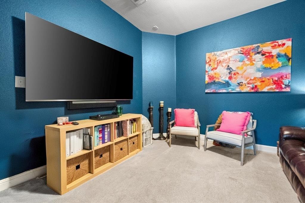 6713 Matador Ranch Road North Richland Hills, TX 76182 - Photo 26 of 39 Living area with baseboards and carpet floors