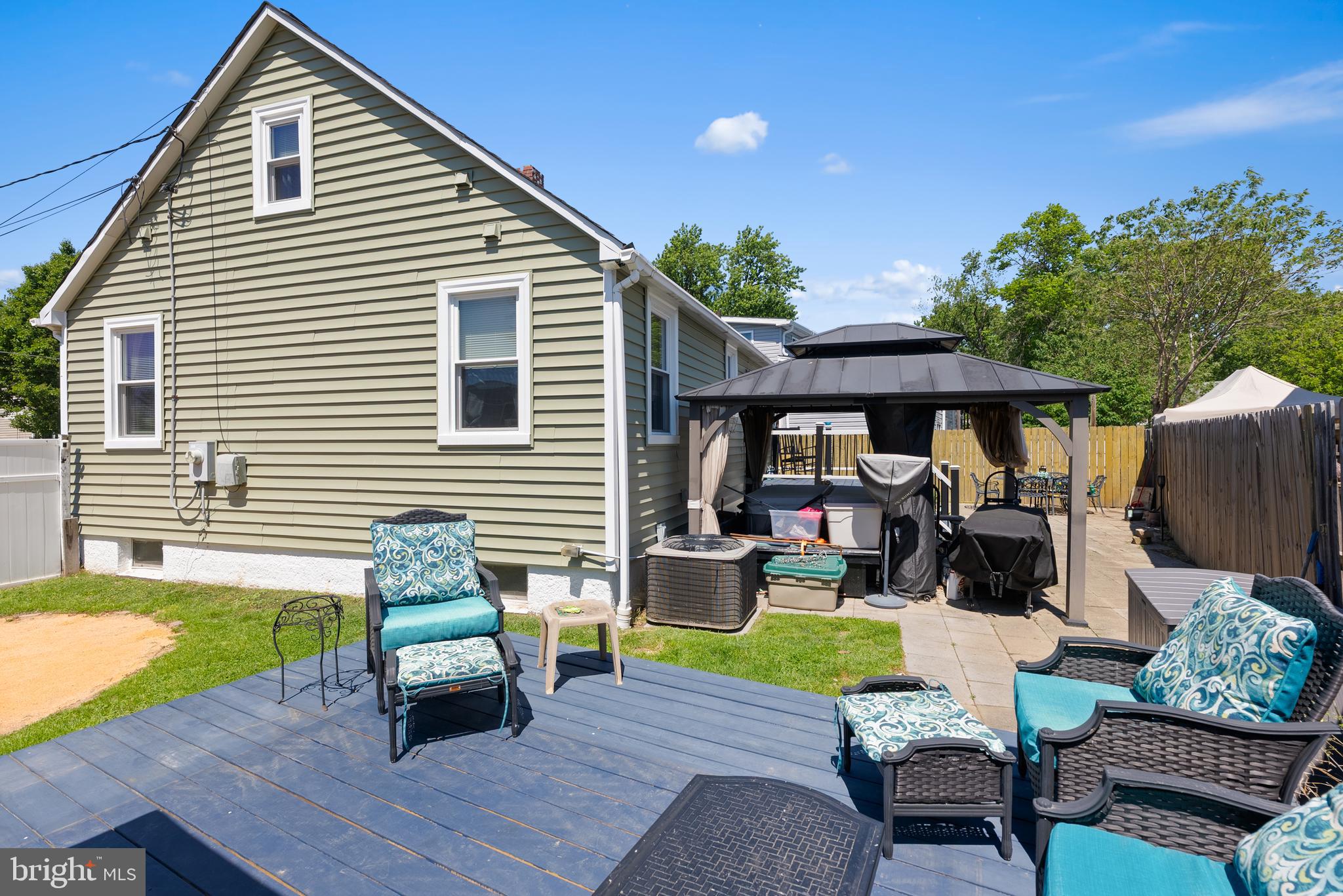 70 Del Rio Road Baltimore, MD 21222 - Photo 36 of 40 a view of a house with a deck and a patio