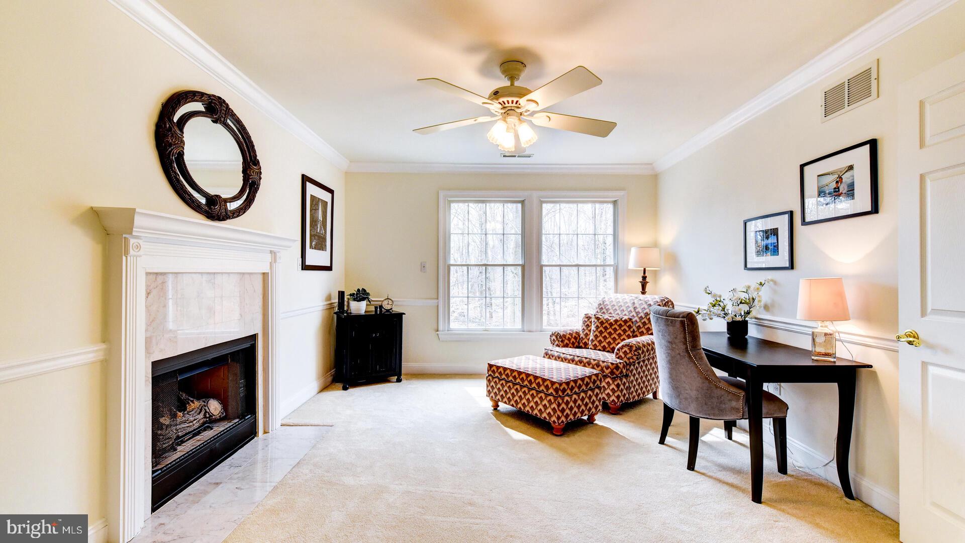 7 Forest Lane Princeton Junction, NJ 08550 - Photo 37 of 74 Sitting Area with Fireplace off Primary Bedroom