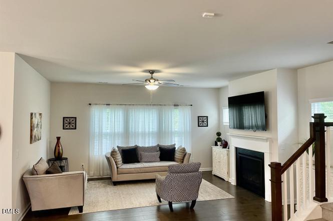 1807 Wrenn Road Durham, NC 27703 - Photo 10 of 43 a living room with furniture and a flat screen tv