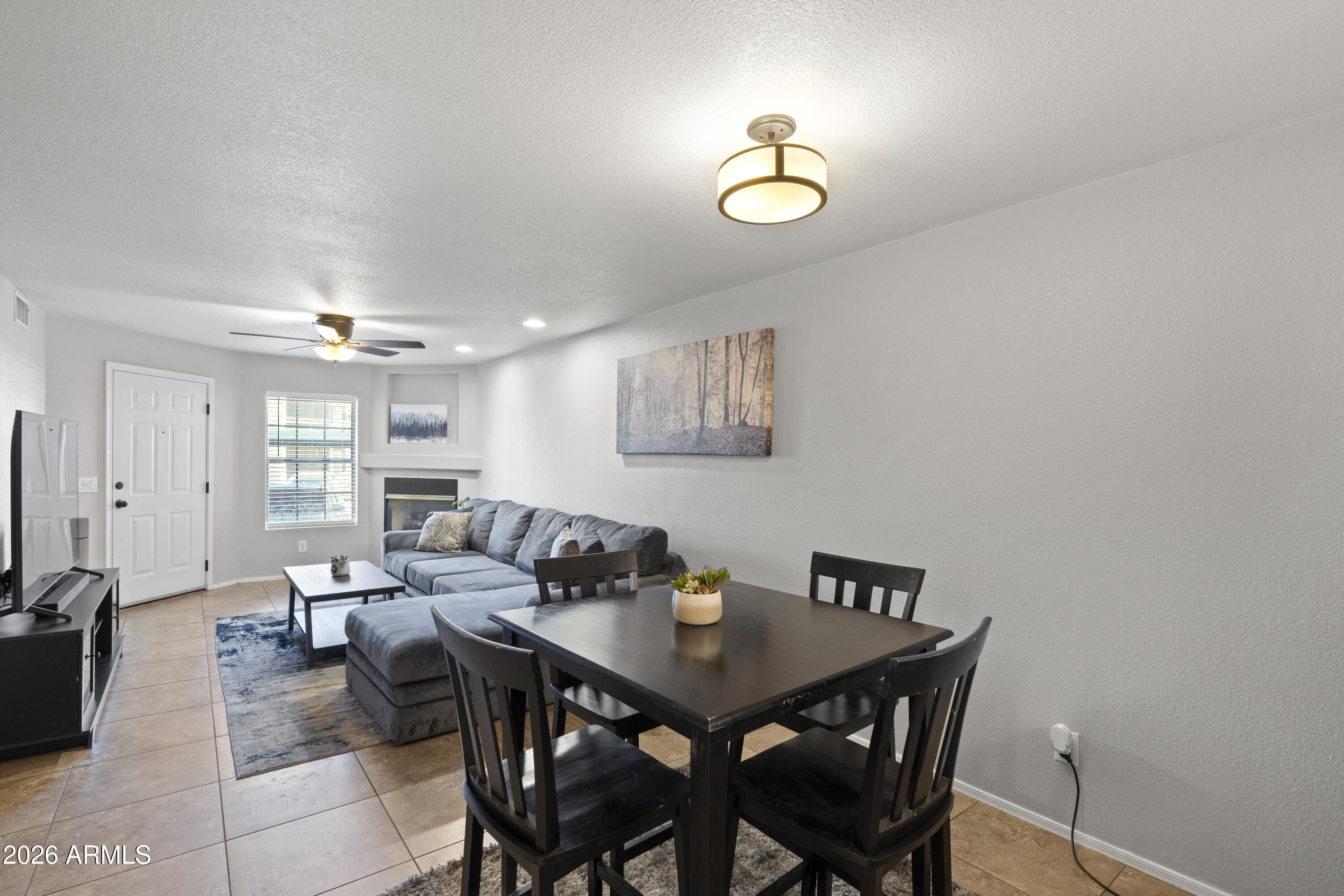 1505 North Center Street, Unit 115 Mesa, AZ 85201 - Photo 4 of 24 a view of a dining room with furniture