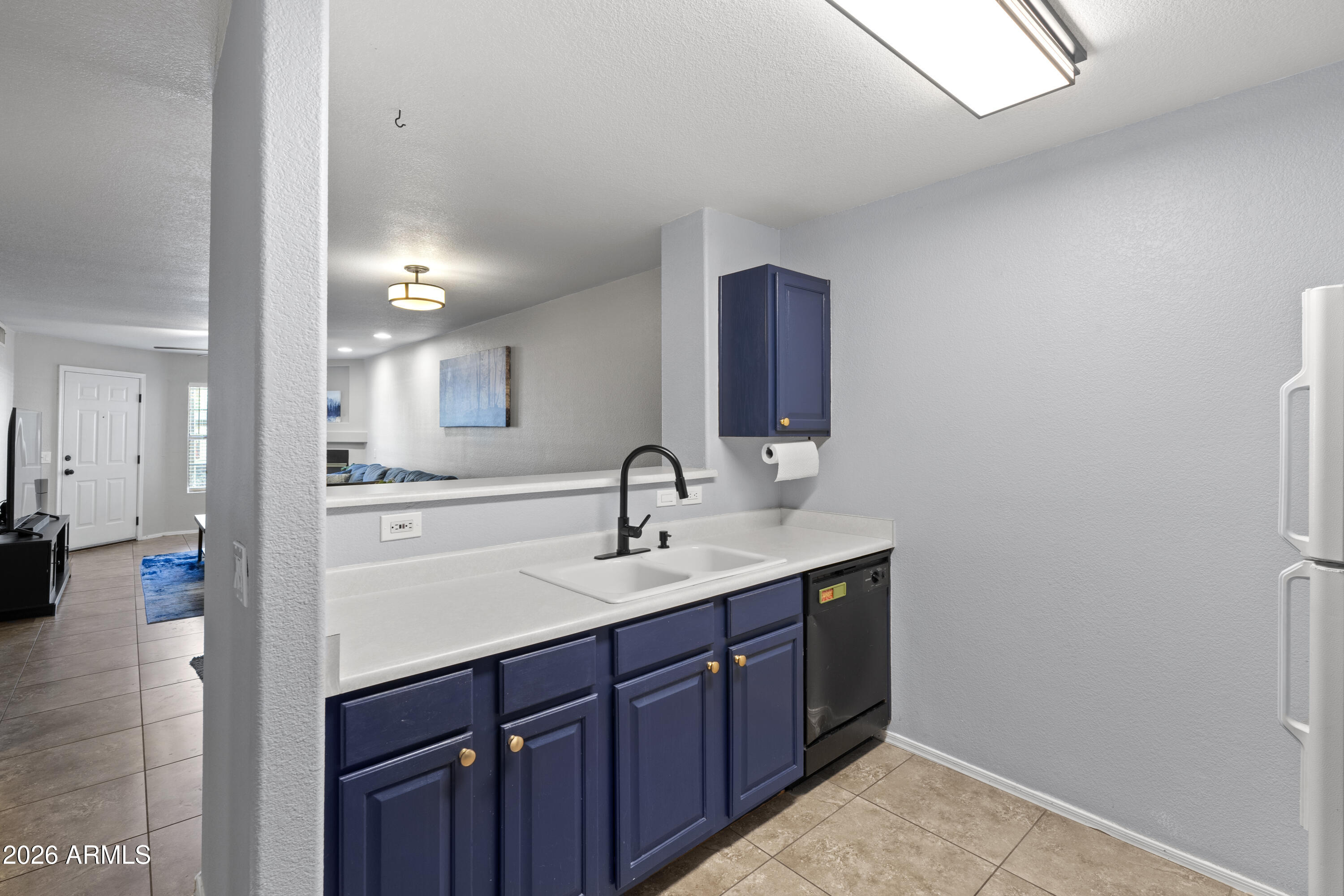 1505 North Center Street, Unit 115 Mesa, AZ 85201 - Photo 10 of 24 a bathroom with a sink and a mirror